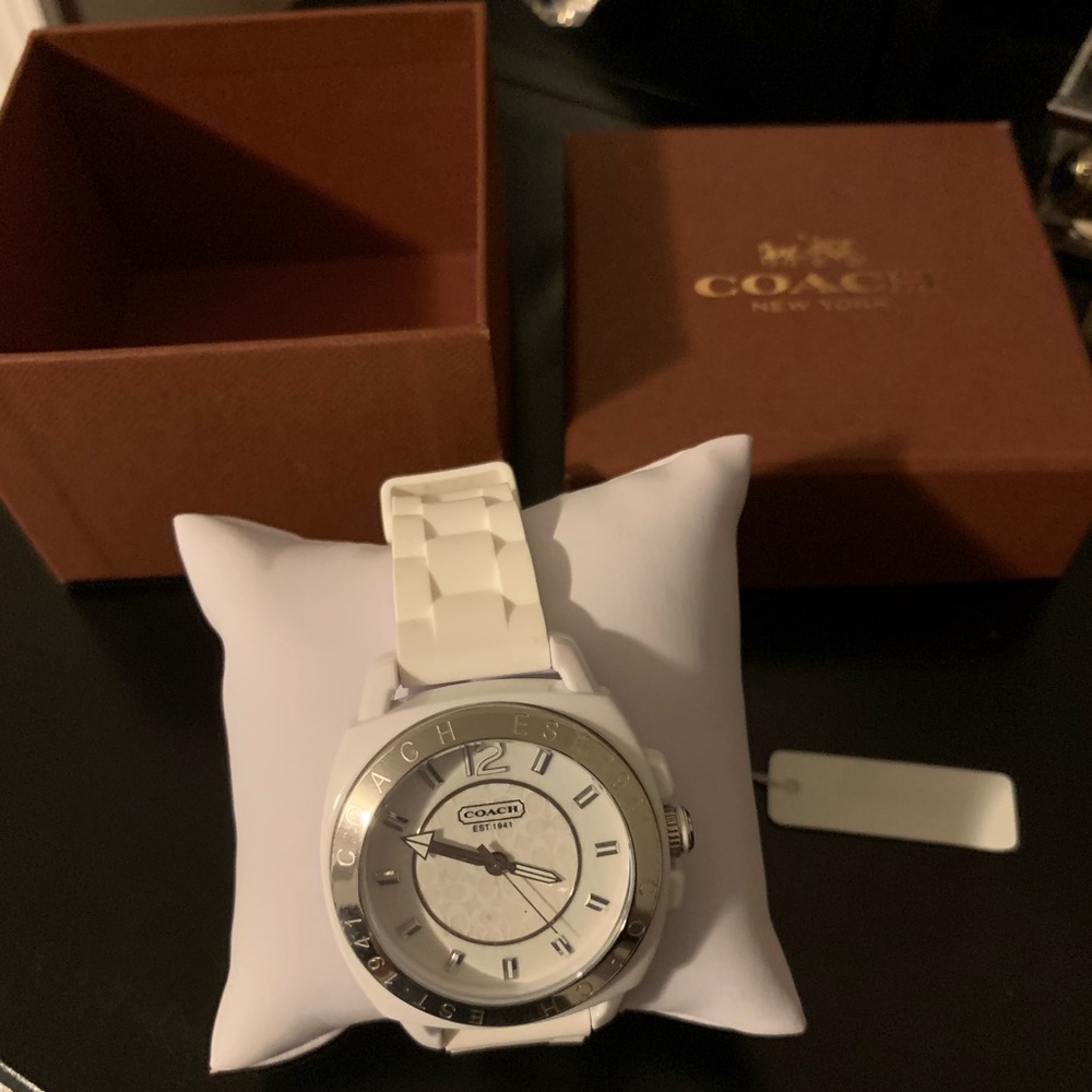 Women’s white Coach watch. New with tags.